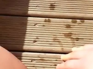She fingers herself outdoor and squirts POV