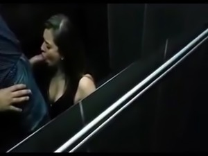 Some slutty wife sucks cock in the elevator