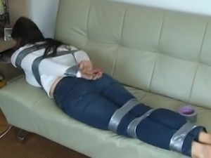 Taped up and helpless on couch