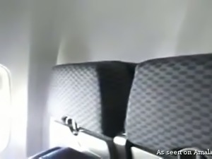 Lovely and horny blonde chick on the plane flashing and masturbating
