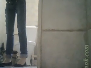 Skinny white girl with tiny booty pissing in the restroom