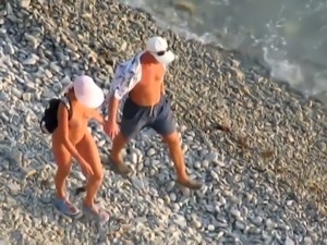 Lewd amateur couple was fucking on the beach and in the sea