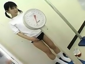 Pigtailed Japanese cutie gets her sexy slim body thoroughly