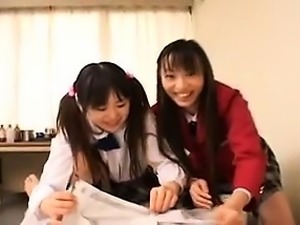 Two cute Japanese girls expose their bodies and share a coc