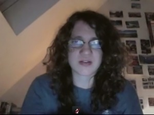 Ugly shemale in glasses showed her tits on a web camera