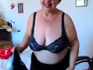 Granny playing with  big boobs on webcam! Amateur!