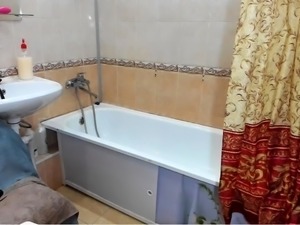 Busty Russian teen exposes her fabulous body in the shower