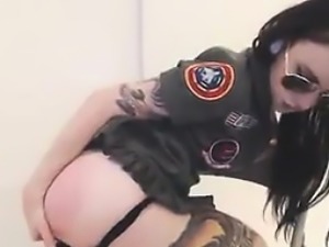 Tattooed Slut Wearing A Sexy Army Outfit