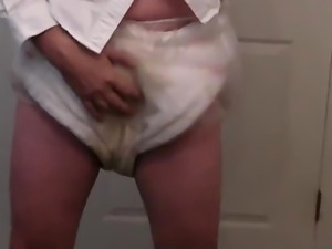 wearing diapers to office and wetting them ..