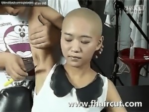 Hairy armpits of asian girl shaved by sharp straight razor.