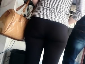 Gal in black pants with a chubby ass is followed by a spy c