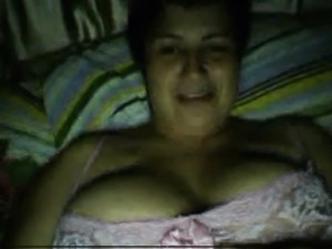 Naughty Russian mom showing her tits on cam while her hubby is sleeping