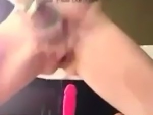 Tttooed bit tits squirting on top of dildo