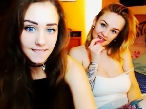 Two sexy girls use vibrator