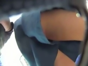 Spying on kinky bootyful girl filming hot upskirt video