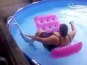 BBW mom falls off a raft in the pool