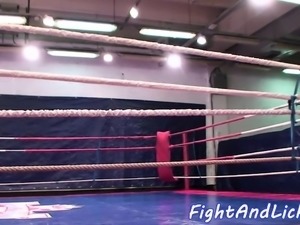 Stunning lesbians wrestling in a boxing ring