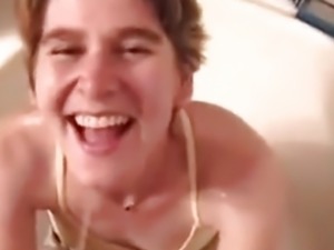 Giving wife golden rain in the tub before I cum on her face