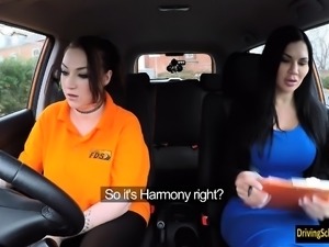 Busty woman Harmony Reigns eats examiner's twat in the car