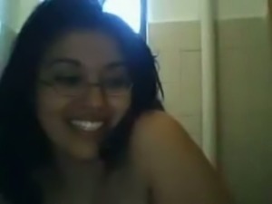 Chubby Latina friend poking her pussy with sex toy in a bathroom