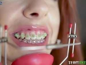 Red haired braceface Cleo Bardot gets nailed from behind damn well