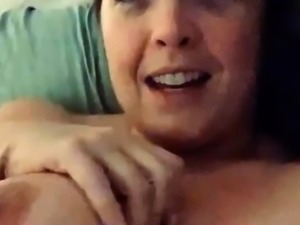 MILF with Big Boobs enjoying herself on cam