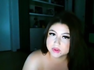 Busty curly brunette with big boobs fucks on couch