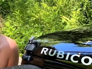 Blonde is flashing her big boobs in the outdoors