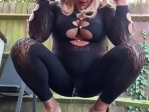 Sexy Crossdresser kellycd2022 in black playsuit and stripper heels